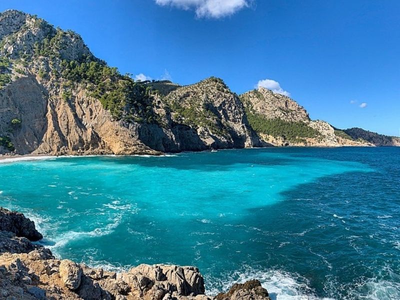 Coll Baix beach dramatic cliffs northern Mallorca