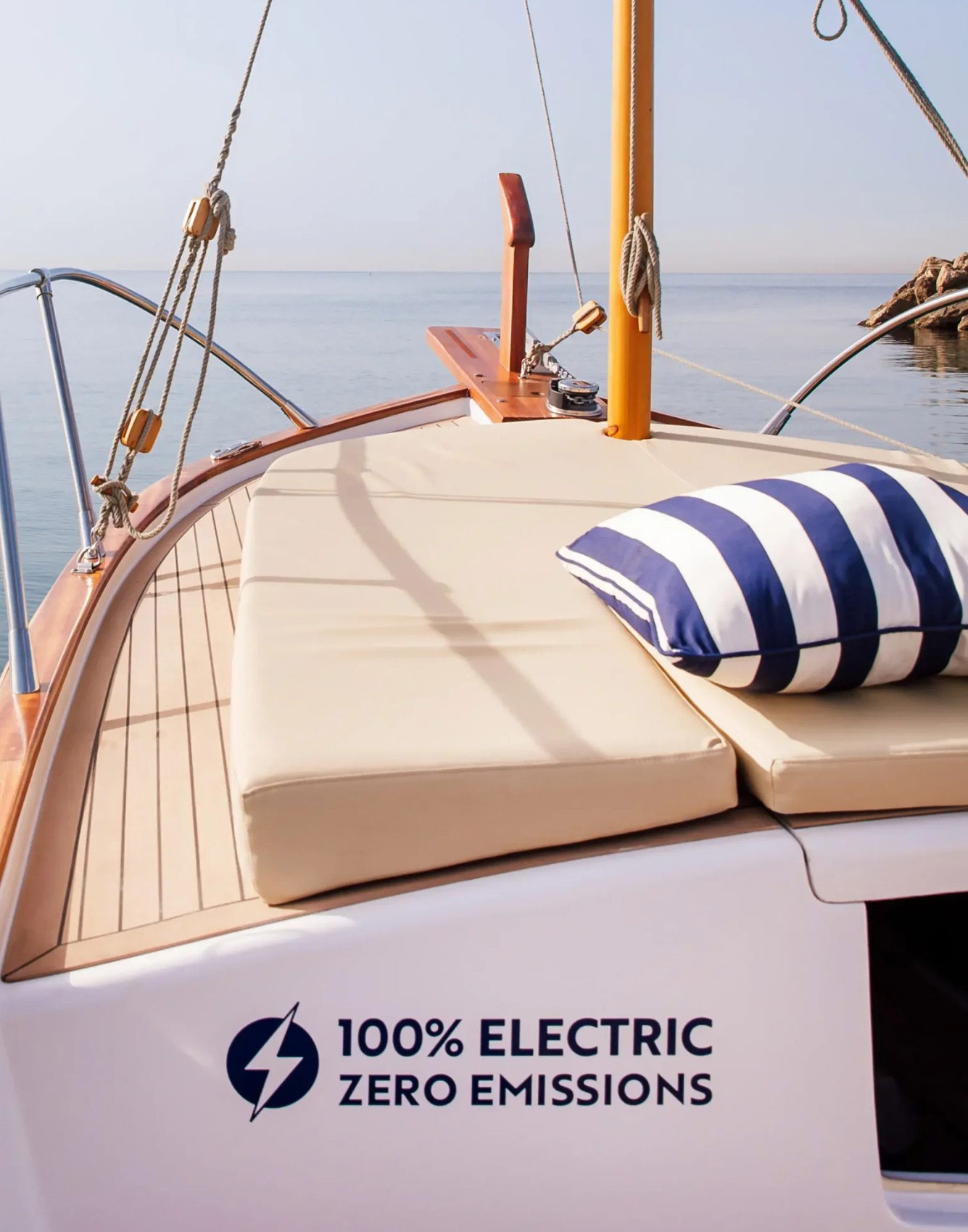Traditional Mallorcan llaut Elysium on Alcudia Bay, wooden boat with electric propulsion